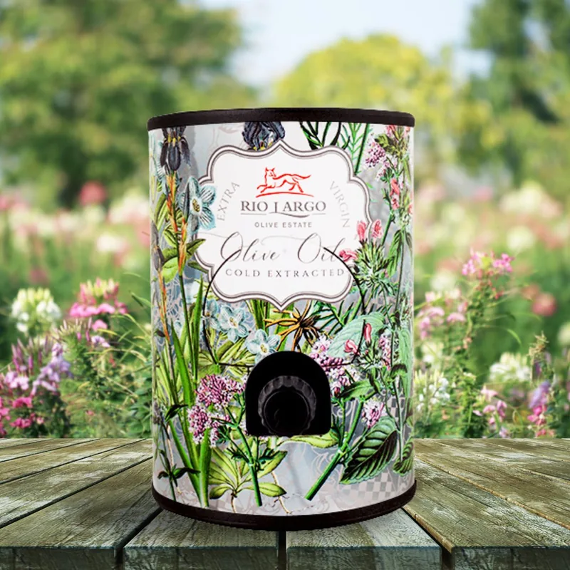 Rio Largo Botanicals decanter, printed with wildflowers and grasses, on a garden table